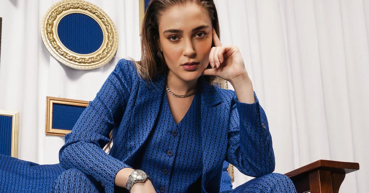 Model wearing a structured blue oversized blazer